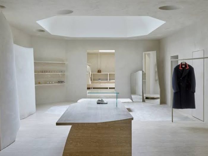Retail store interior with display shelving at Maison Studio Store